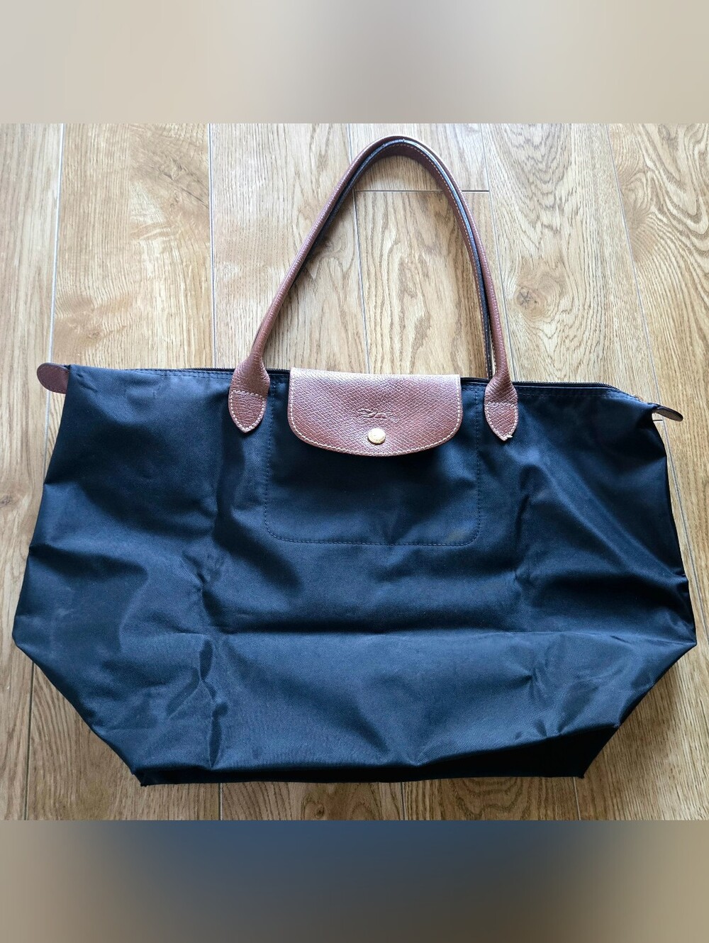 LONGCHAMP "Le Pliage" Foldable Tote In Classic Black With Cognac Leather Handles